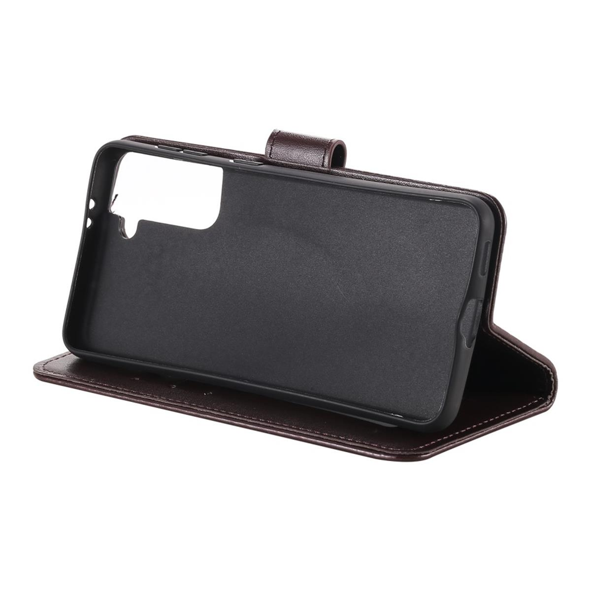 Eine braune Handyhülle, geöffnet, um den Handyhalter zu zeigen.