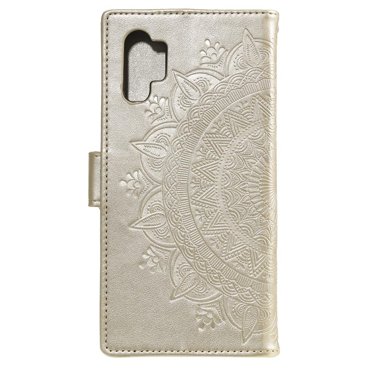 Goldene Handyhülle mit geprägtem Mandala-Design, Kameraausschnitt und Magnetverschluss.