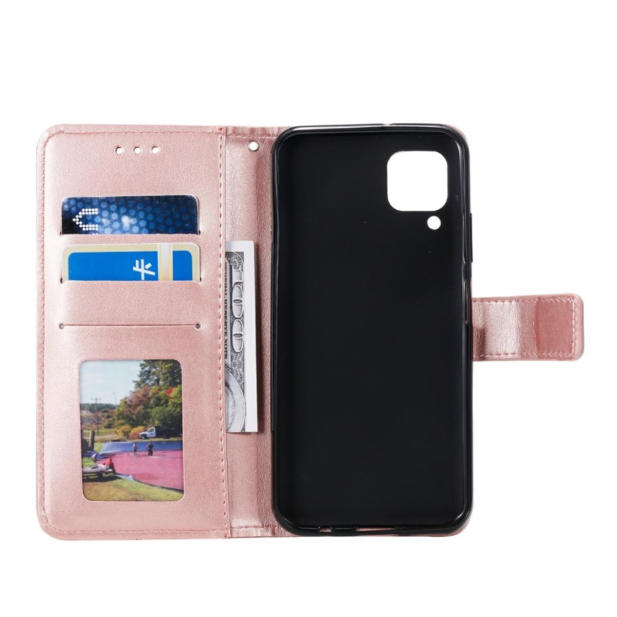 Eine offene rosa Handyhülle mit Telefon, Kartenfächern, Bild und Geld.