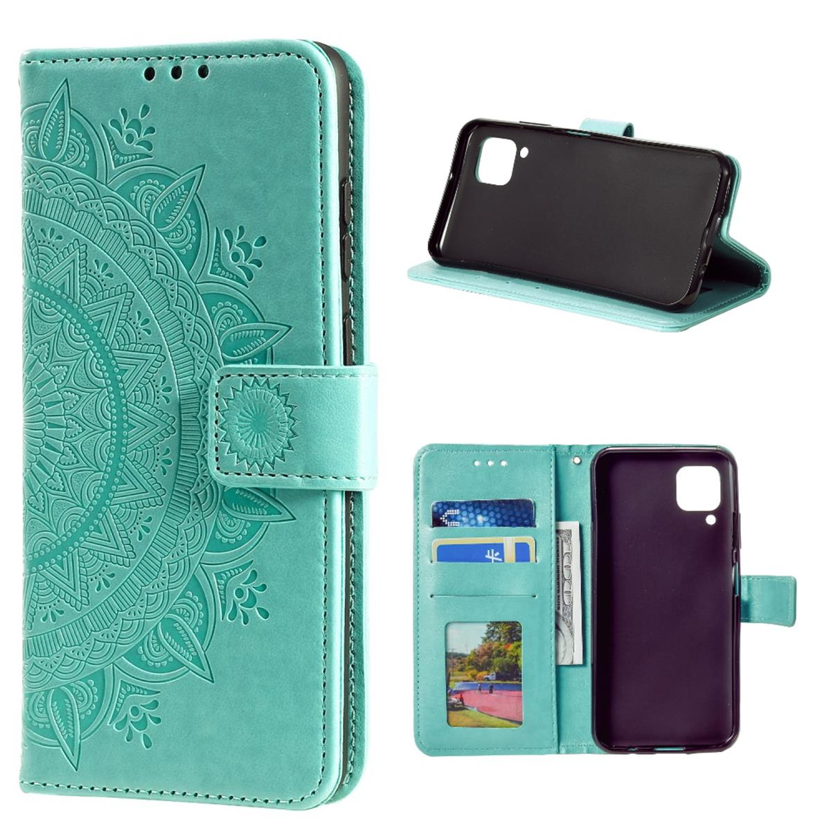 Türkisfarbene Handyhülle mit Mandala-Design, offen mit Handy und Kartenfächern.