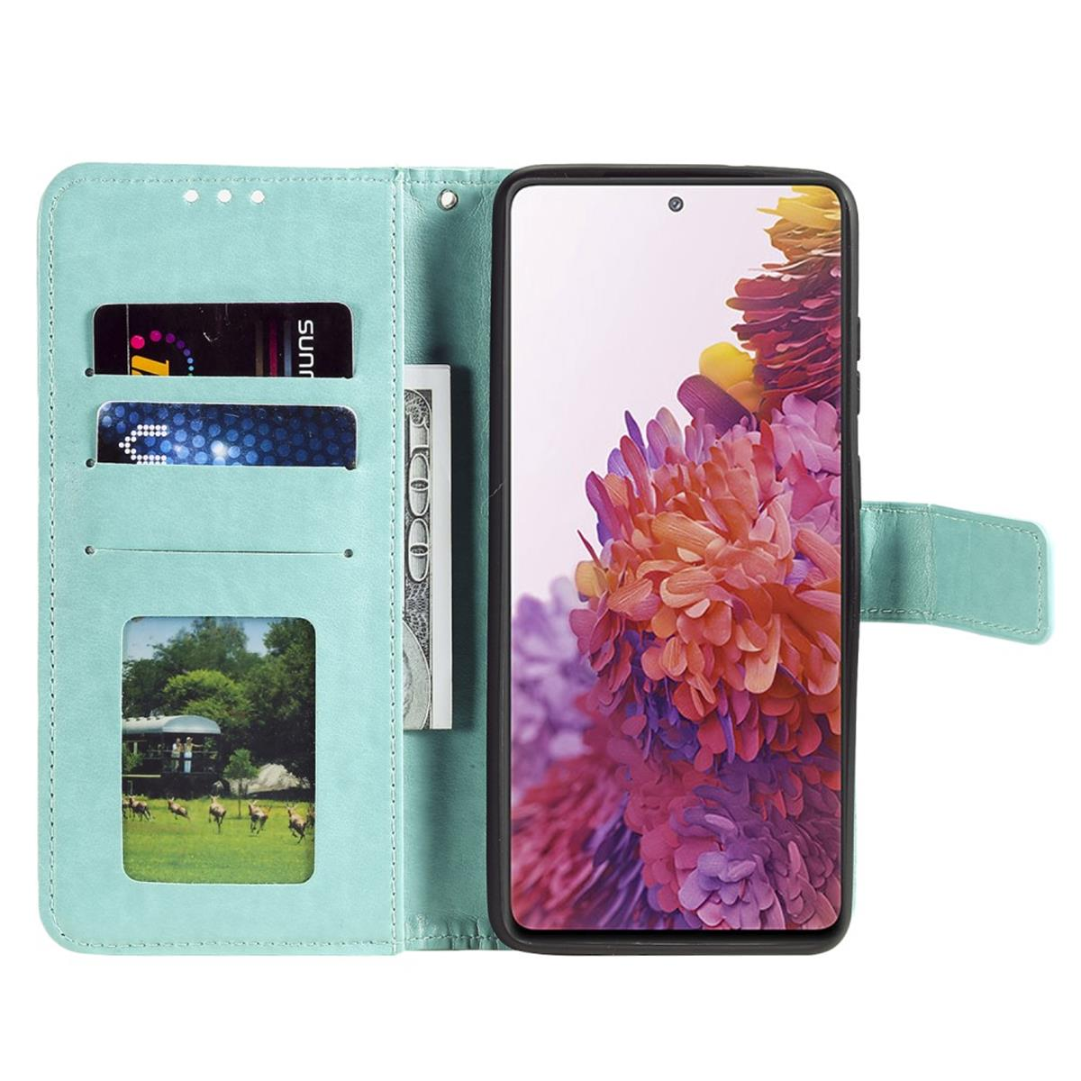 Eine offene Handyhülle mit Telefon, Karten und Geld. Innen ein Bild von Rehen. Die Hülle ist mintgrün.