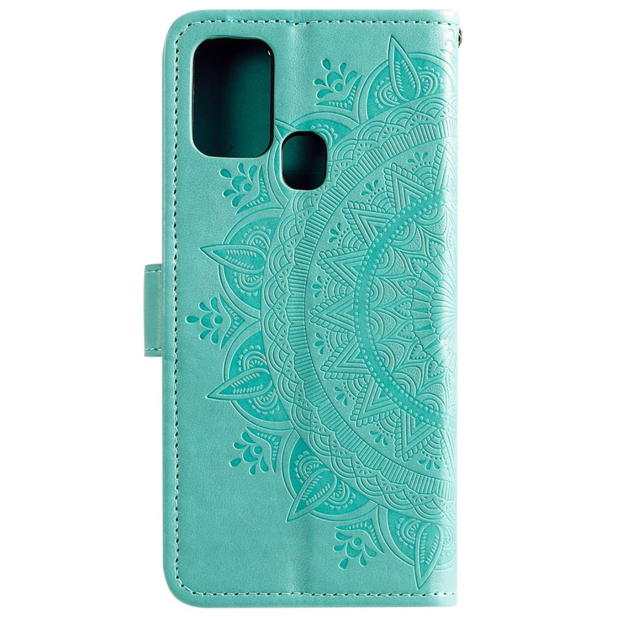 Eine türkisfarbene Handyhülle mit Mandala-Design. Weißer Hintergrund.