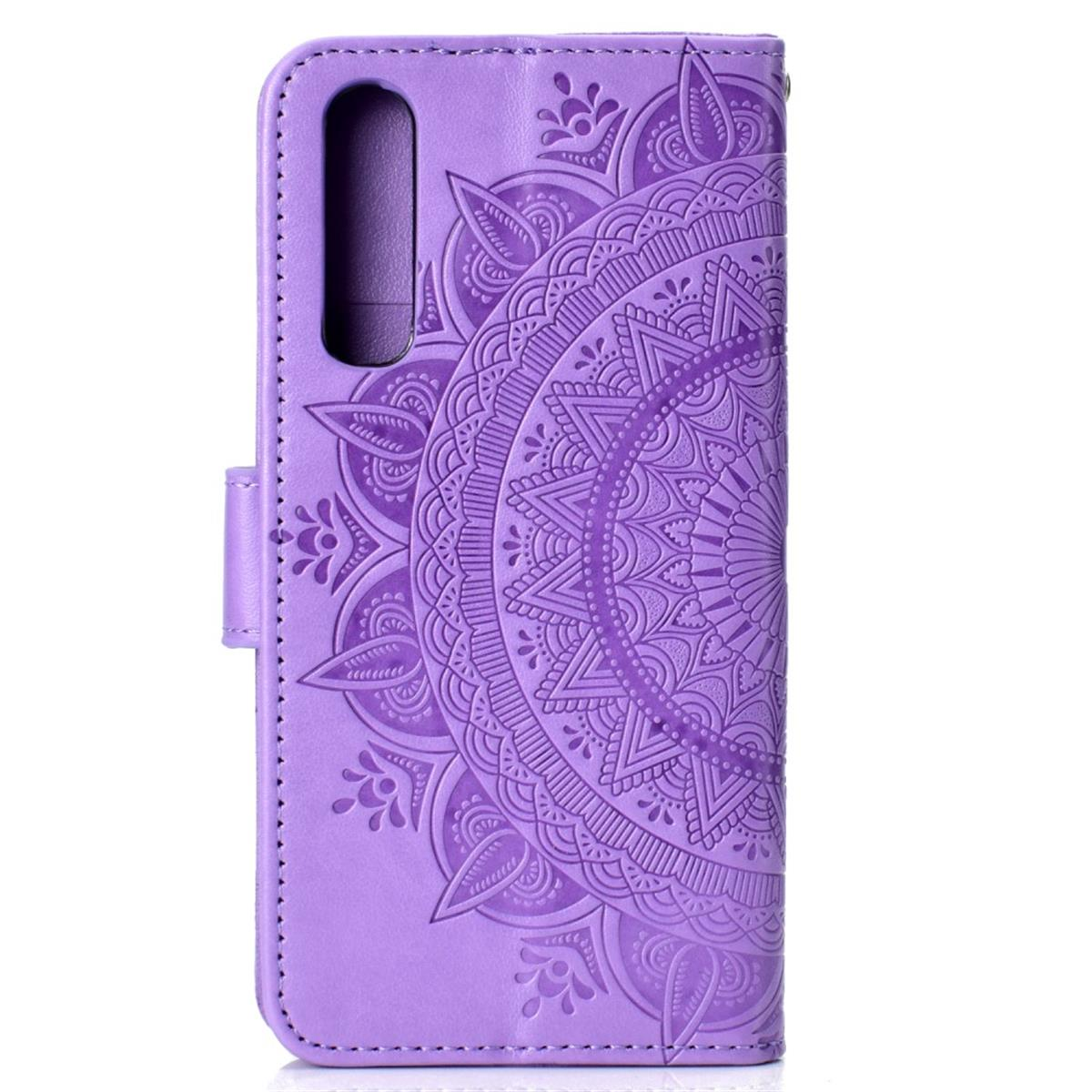 Violette Handyhülle mit Mandala-Muster.