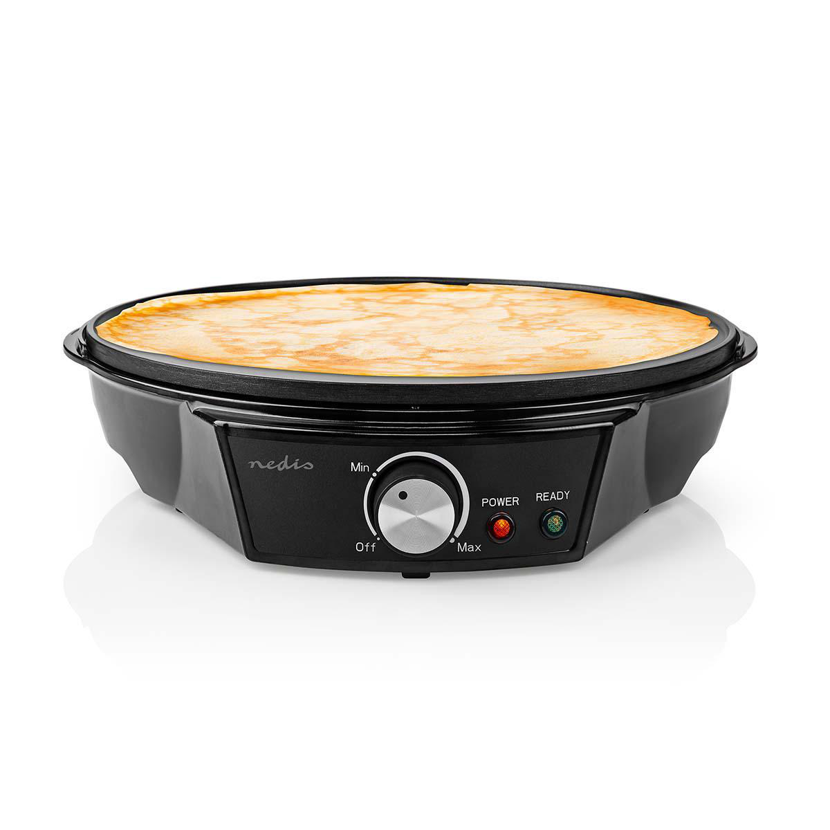 Una crepiera nera con una crepe sopra, comandi visibili.
