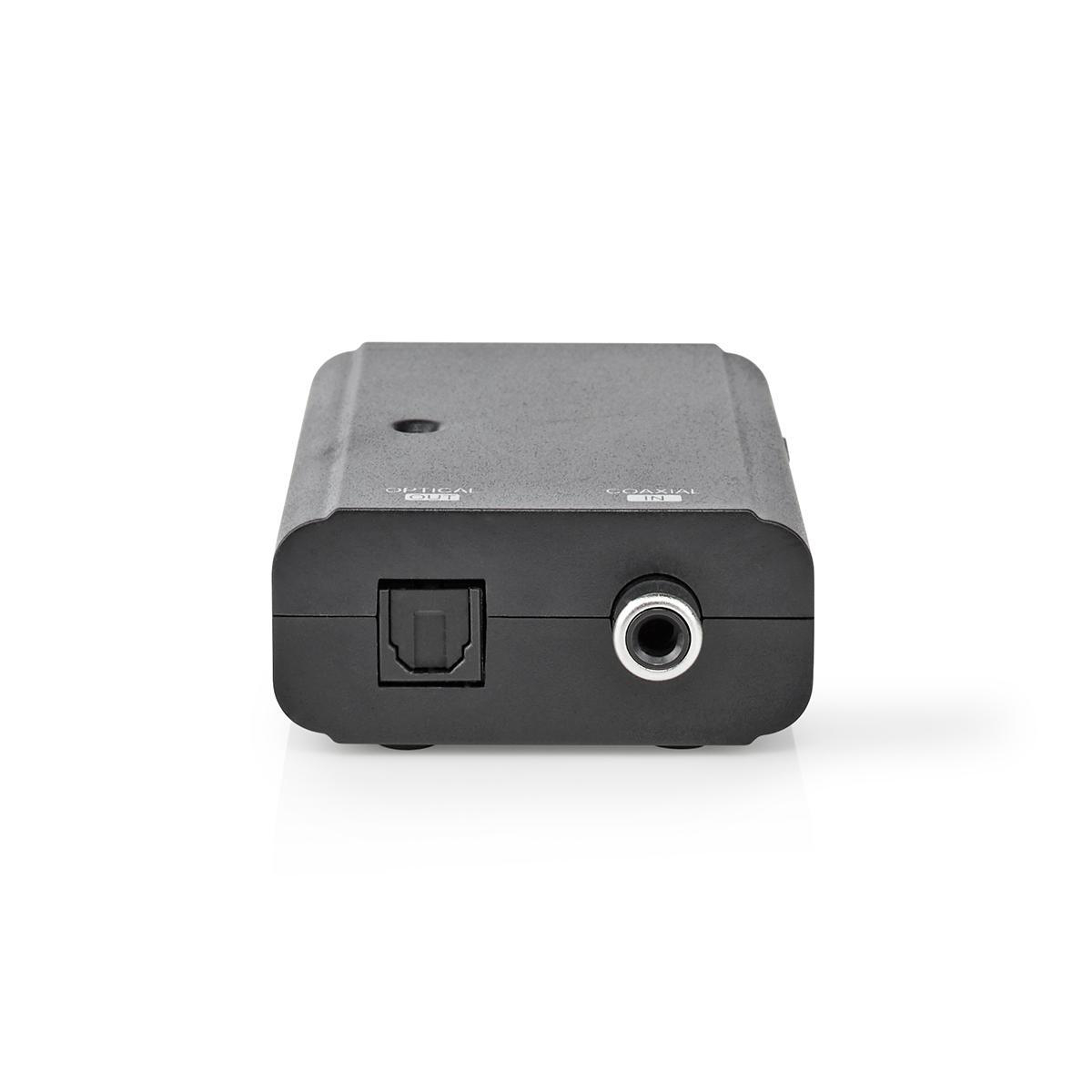 Eine schwarze Audio-Konverterbox. Sie hat einen optischen Eingang und einen koaxialen Ausgang. Das Design ist minimalistisch.