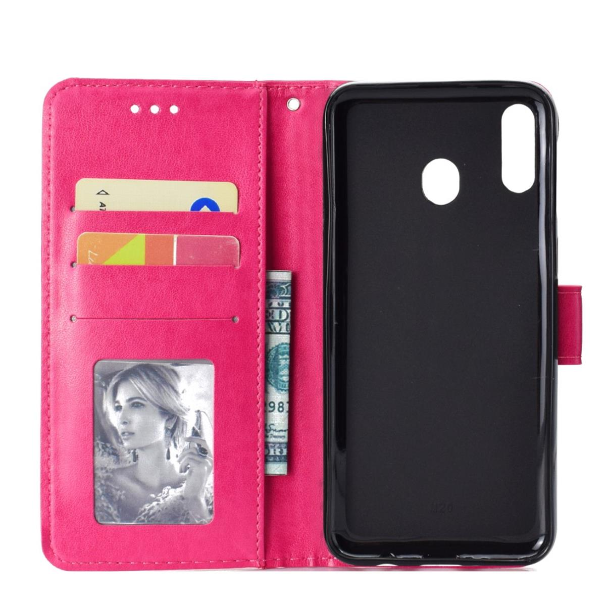 Geöffnete rosa Geldbörse mit Karten, einem Foto und einem US-Dollar-Schein.