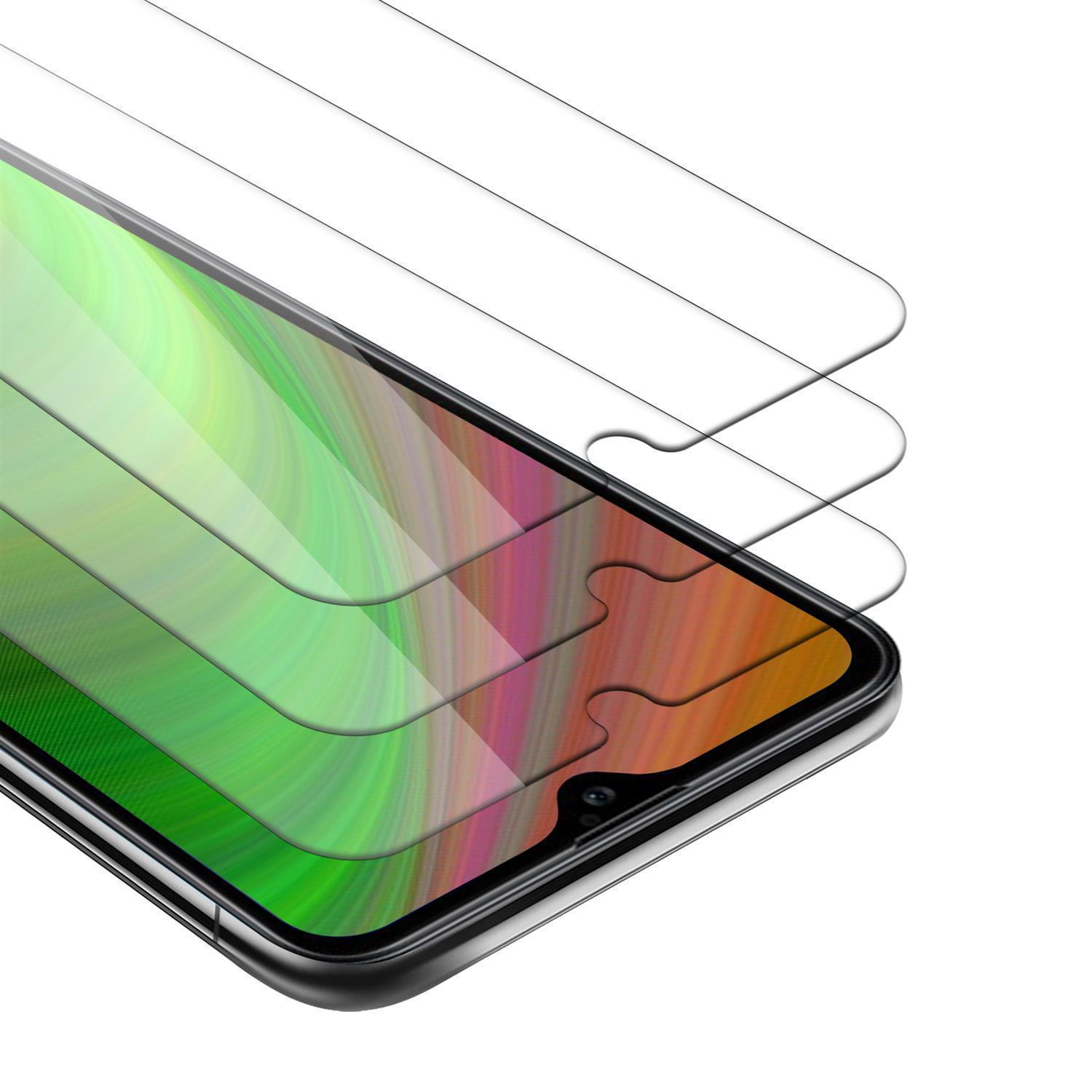 Tres protectores de pantalla superpuestos a un smartphone. Muestra un degradado verde y morado.