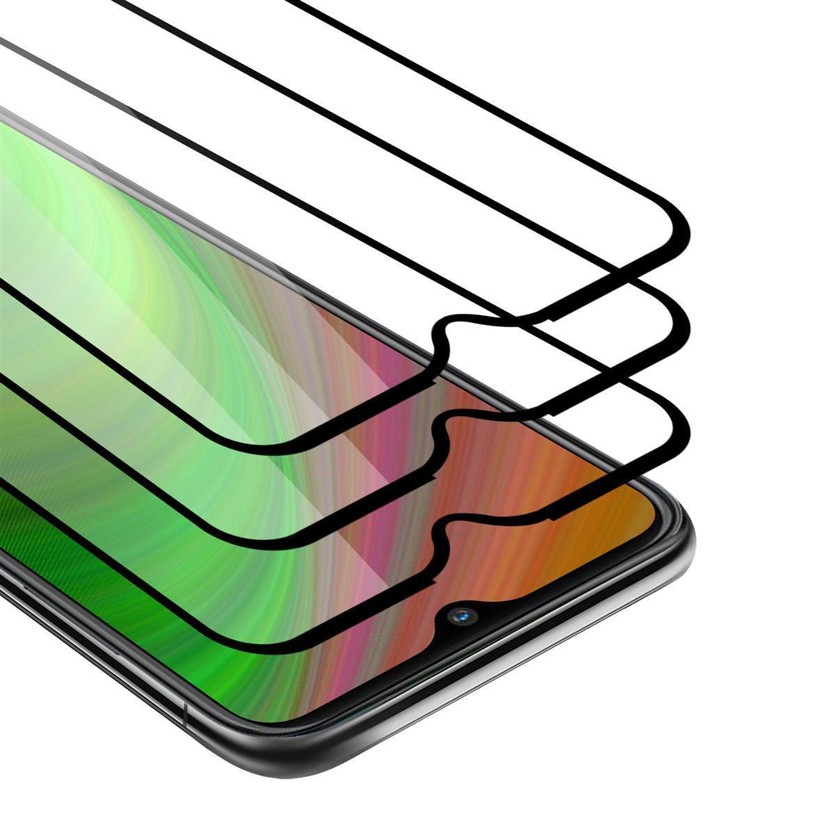 Tre protezioni schermo su un telefono che mostra colori verdi e neri.