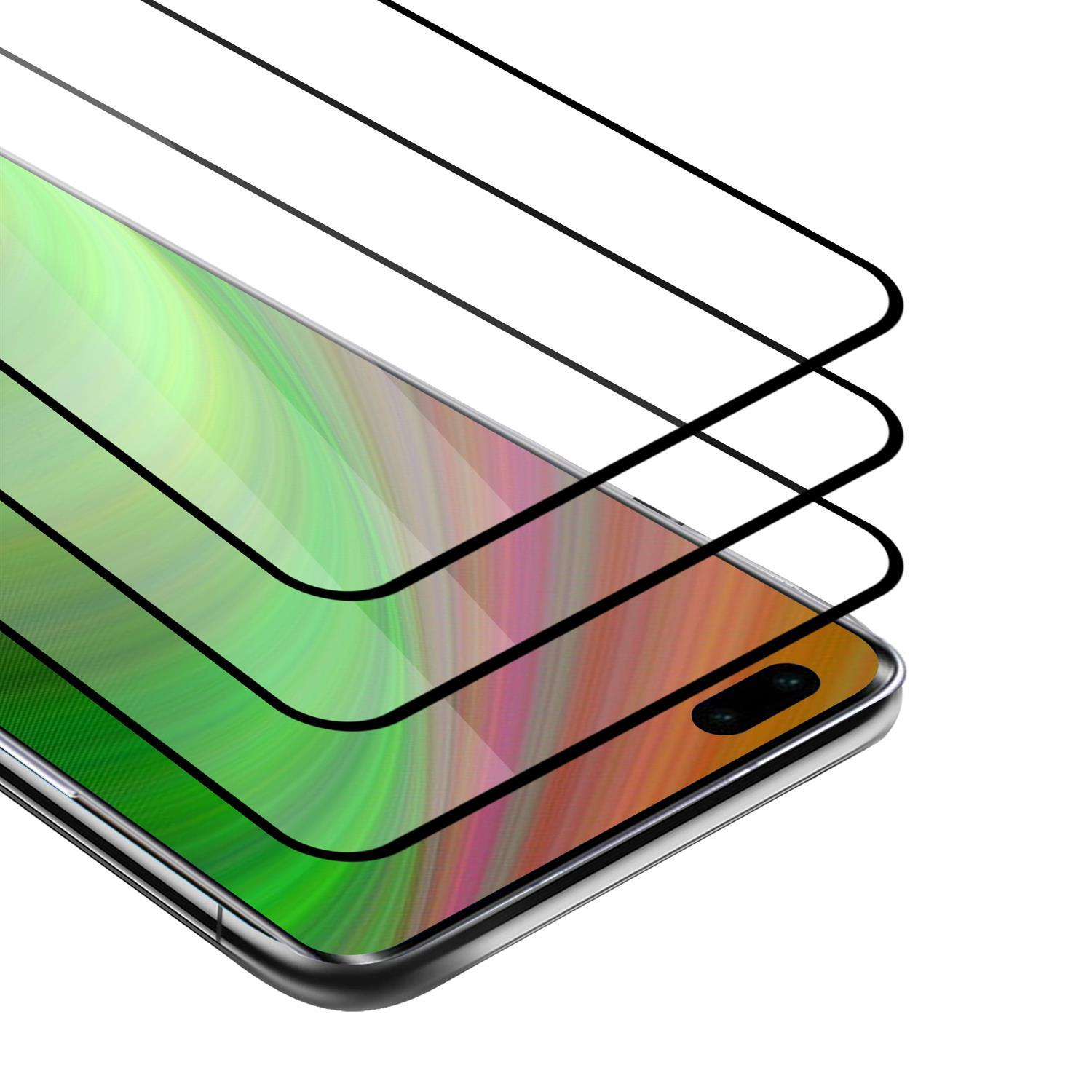 Un telefono con tre protezioni per lo schermo, sovrapposte. Lo schermo mostra uno sfondo colorato.