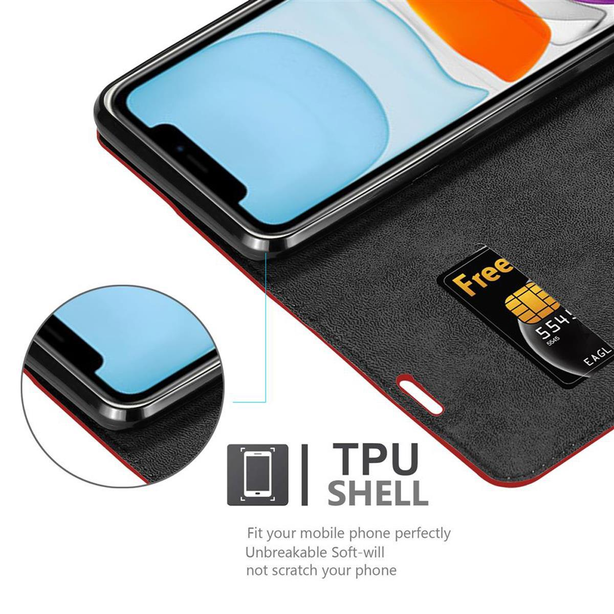 Telefono nero in custodia, con fessura per carta di credito. Testo: 'TPU SHELL'.