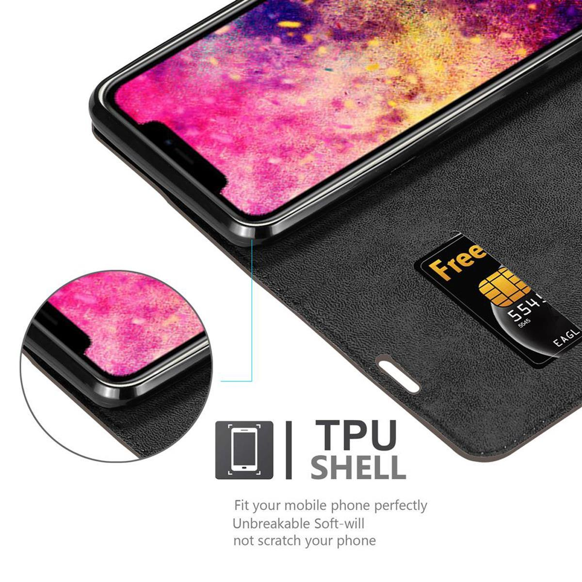 Smartphone in una custodia a portafoglio con carta di credito. Lo schermo mostra un'immagine con sfumature rosa.