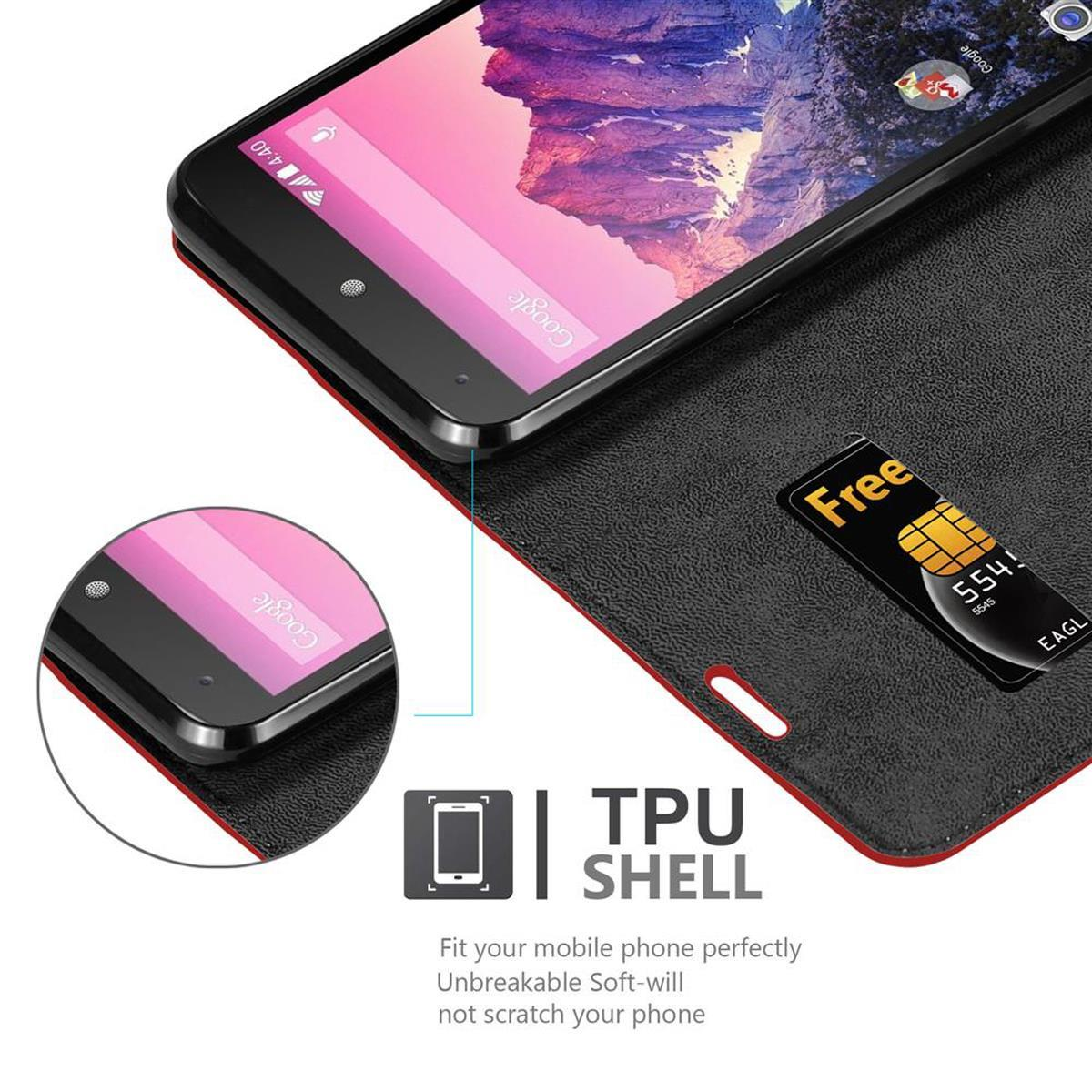 Teléfono negro en una funda negra. El teléfono está encendido, mostrando la interfaz de Google. Texto de la carcasa de TPU presente.