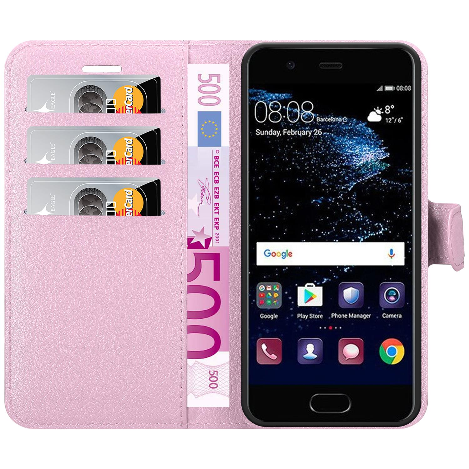 Custodia per telefono rosa con telefono, carte e denaro. Il telefono è a destra. Sfondo bianco.
