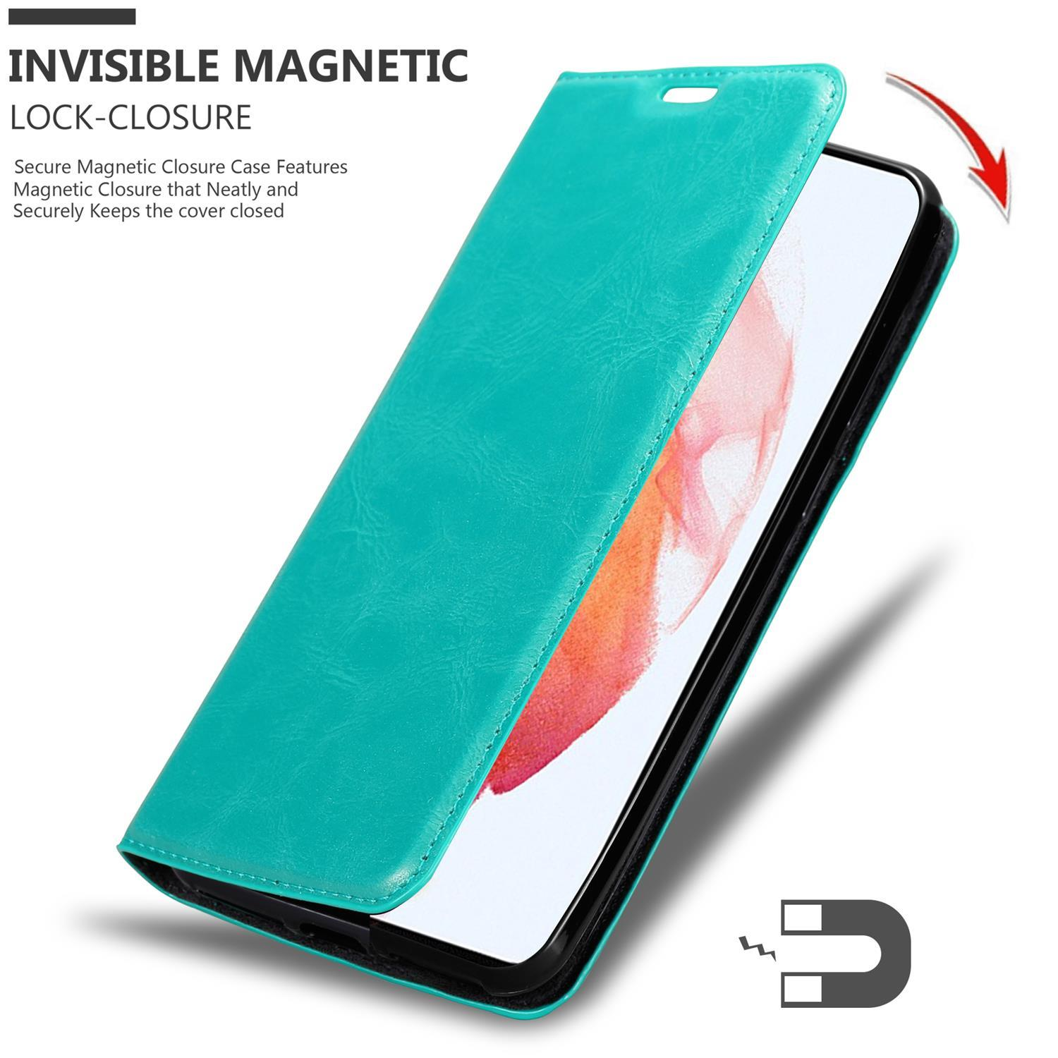 Türkisfarbene Wallet-Hülle, Telefon darin, geschlossen. Magnetverschluss. Telefonbildschirm teilweise sichtbar. Weißer Hintergrund.