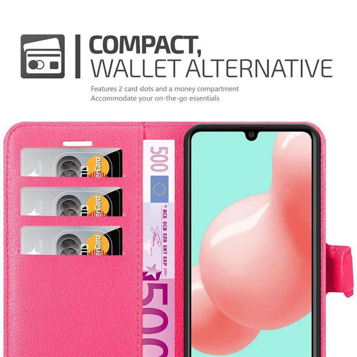Rosa Handy-Geldbörsenetui mit Kartenfächern und Bargeld mit Karten. Ein Telefon befindet sich in dem Etui.
