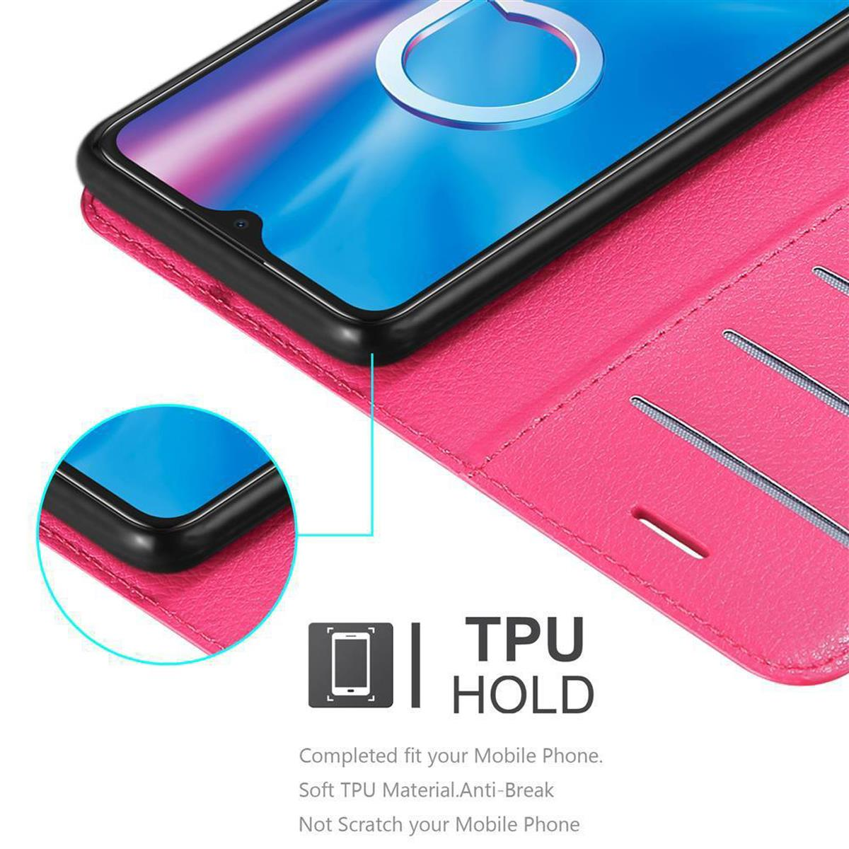 Primo piano di una custodia per telefono rosa con un telefono all'interno, contrassegnata dalla scritta 'TPU HOLD'.