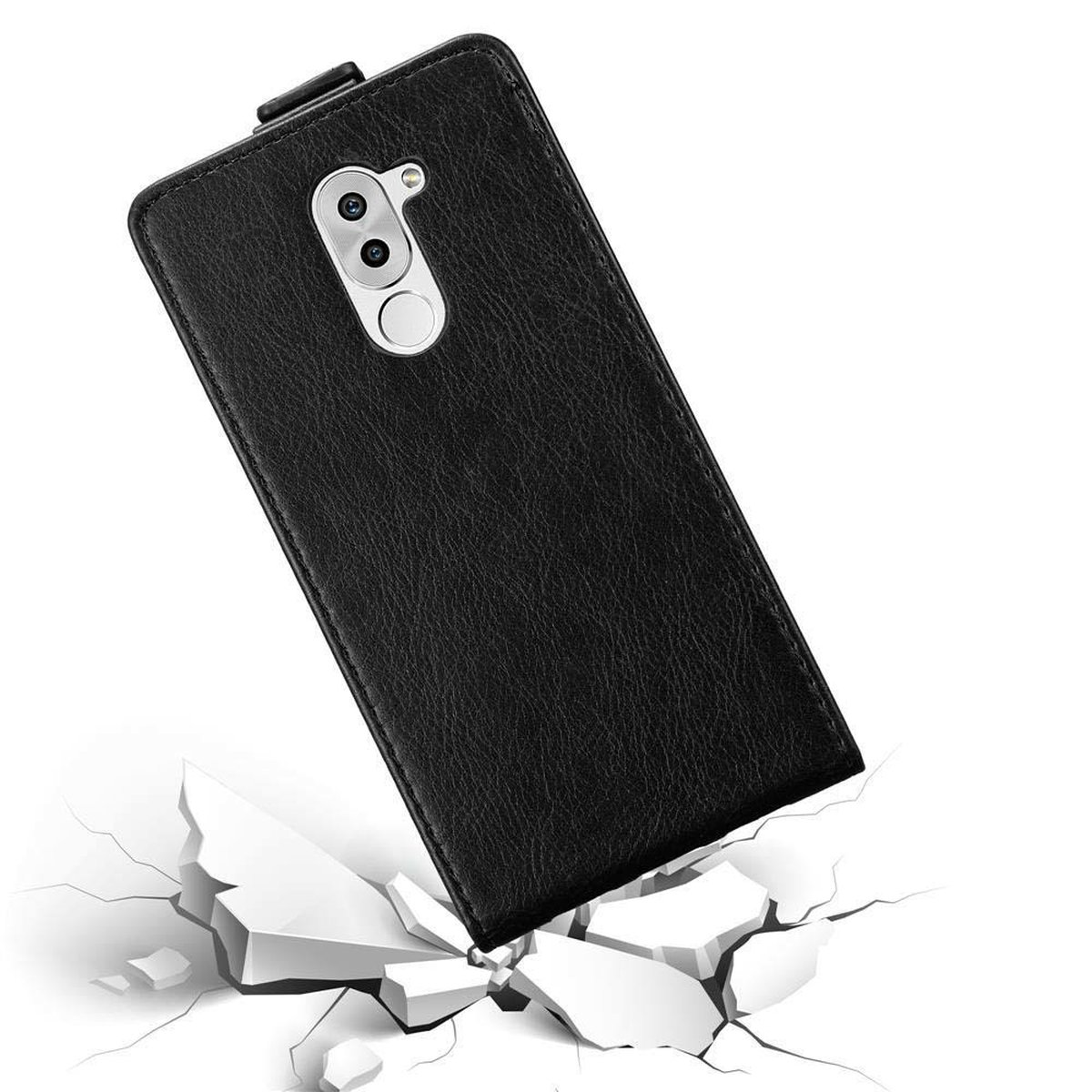 Custodia per telefono nera, chiusa. Appoggia su superficie bianca rotta. Mostra il design della custodia.