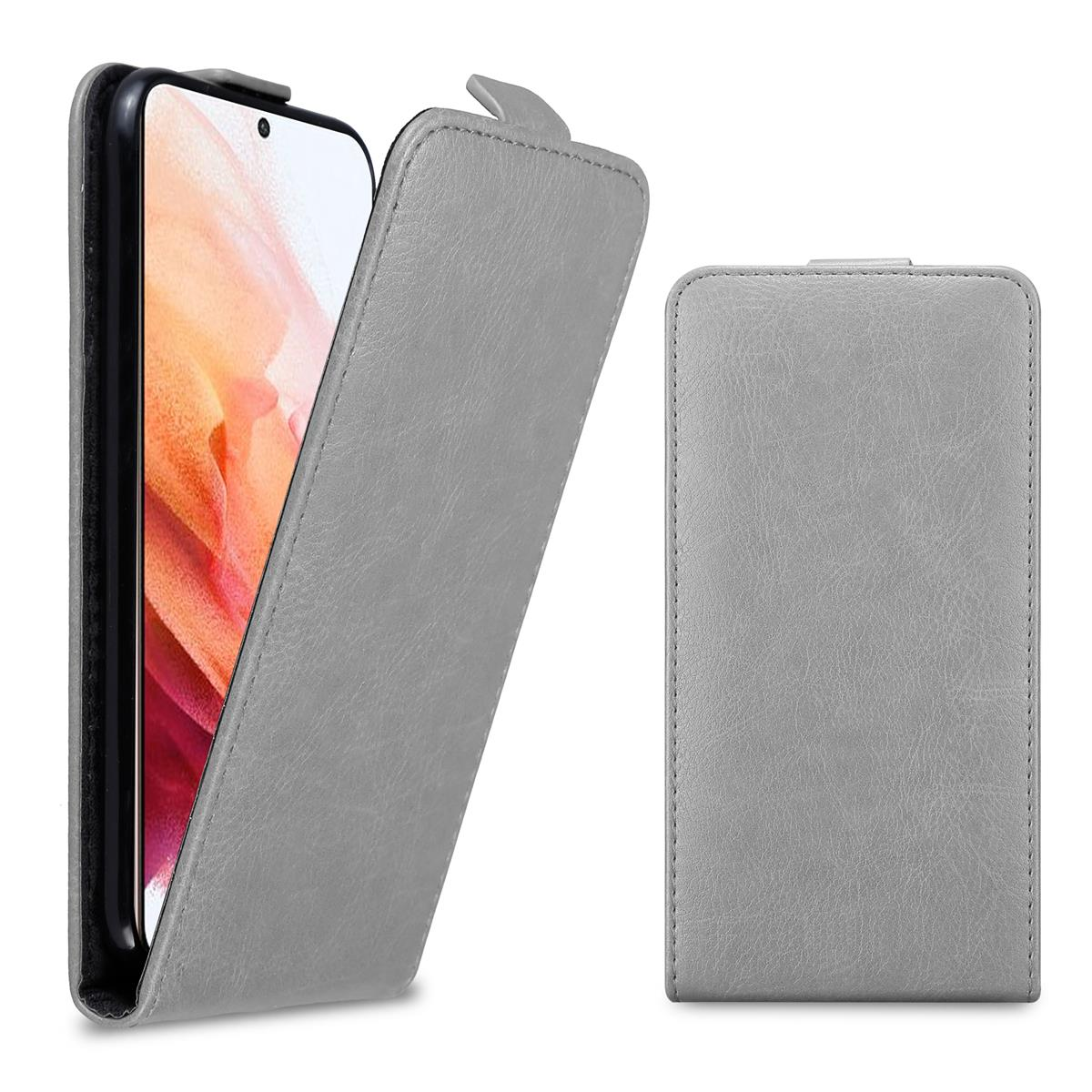 Eine graue Handyhülle offen mit einem Telefon darin. Das Telefon befindet sich auf der linken Seite. Rückseite rechts.