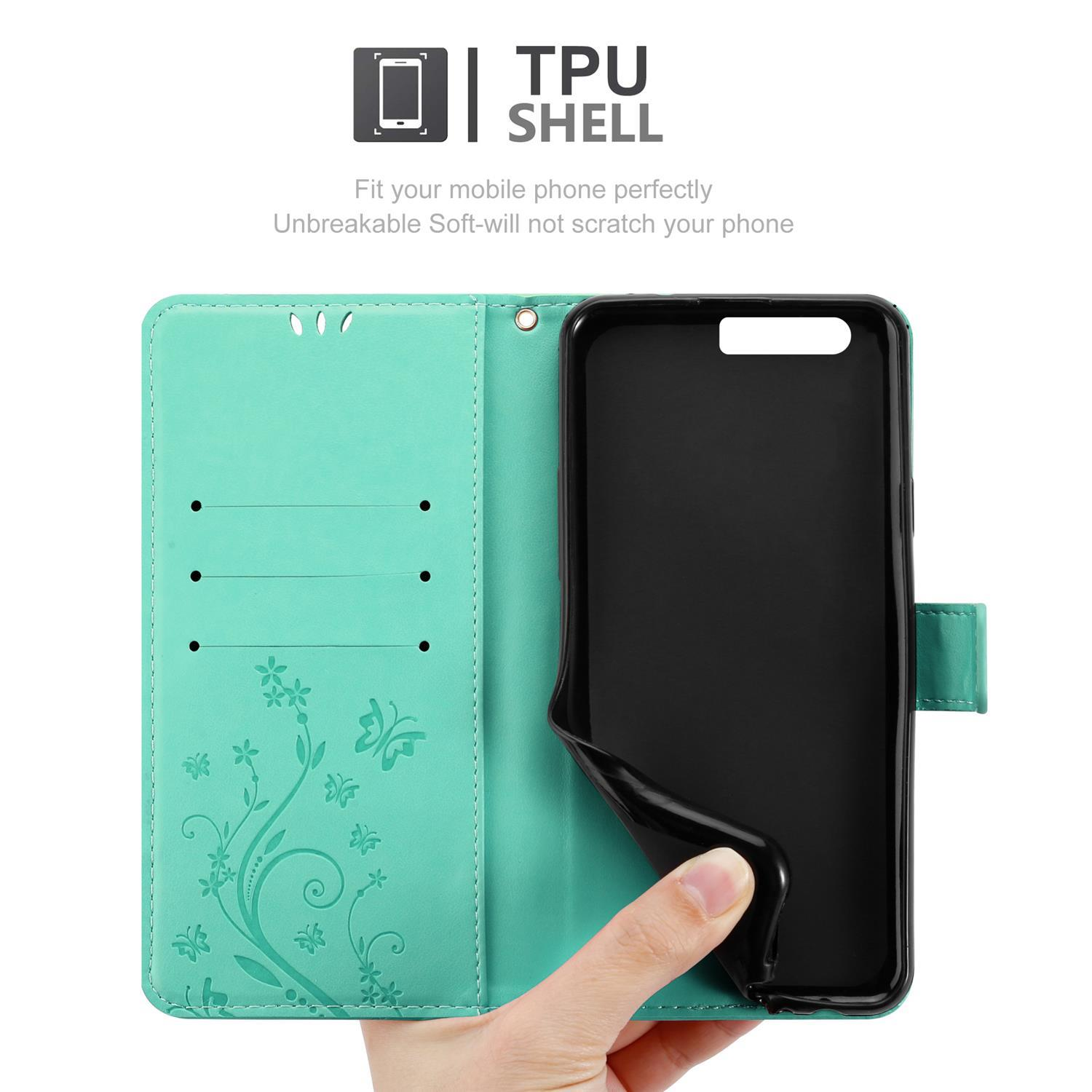 Custodia per telefono verde acqua aperta con telefono dentro. Il testo dice guscio in TPU. Mano che tiene.