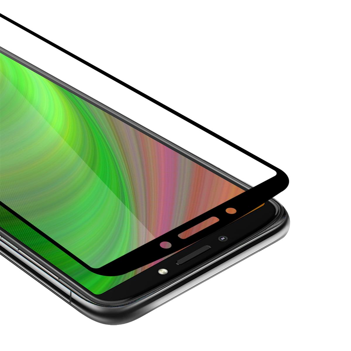 Un telefono con una protezione per lo schermo. La protezione ha un contorno nero.