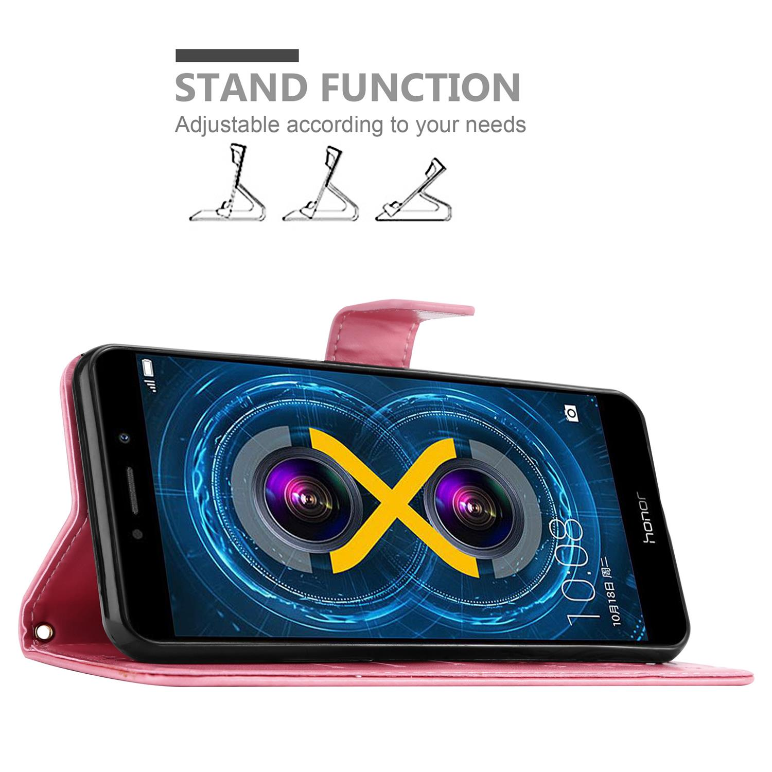 Custodia rosa per telefono con telefono all'interno. Funzione stand. Il telefono mostra un logo giallo.