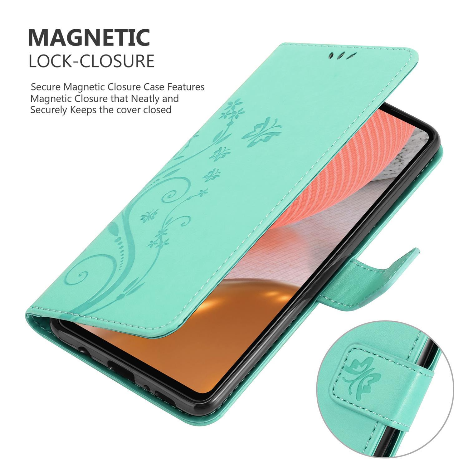 Una custodia per telefono verde menta con design floreale, aperta per mostrare un telefono nero. Chiusura magnetica visibile.