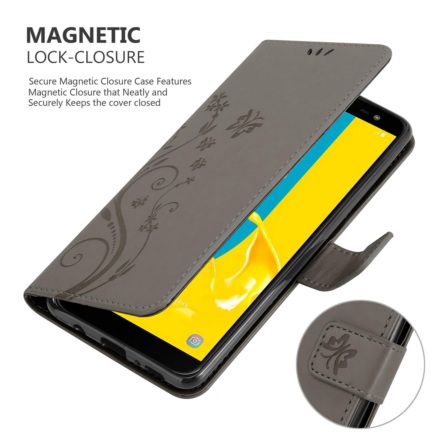 Una custodia grigia per telefono con un motivo floreale è aperta, rivelando un telefono. La custodia ha una chiusura magnetica.