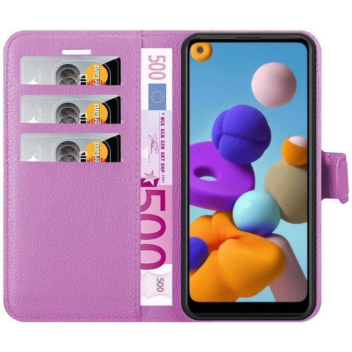 Custodia a portafoglio rosa con telefono. Contiene carte e denaro. Il telefono mostra sfere colorate.