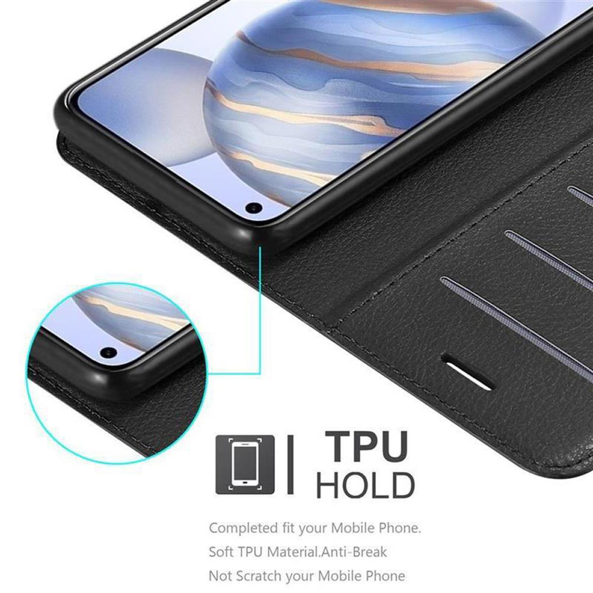 Un telefono nero in una custodia con un supporto in TPU. Il telefono è visibile. La custodia è chiusa.