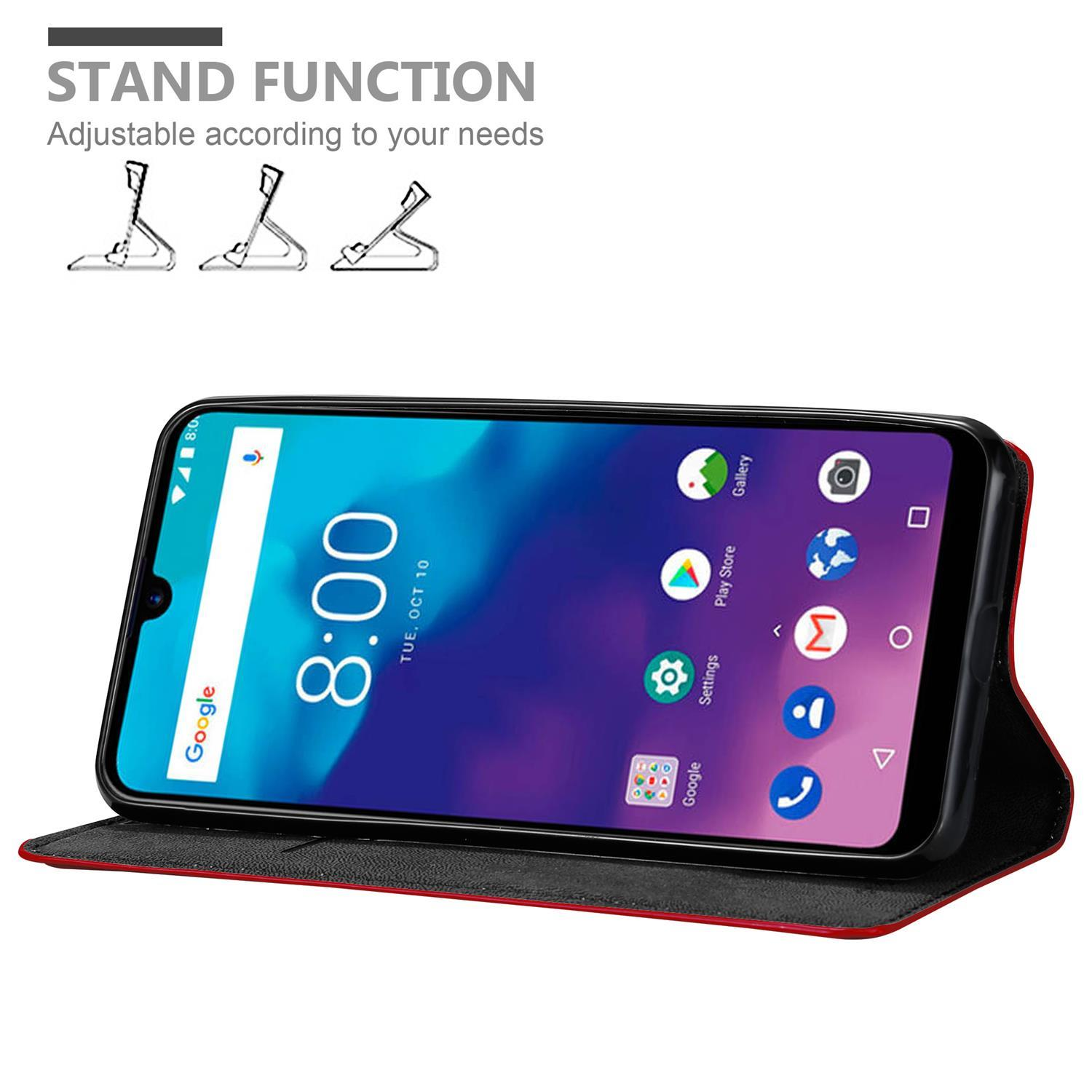 Telefono in una custodia, aperto. Interno rosso, esterno nero. Viene mostrata la funzione supporto.
