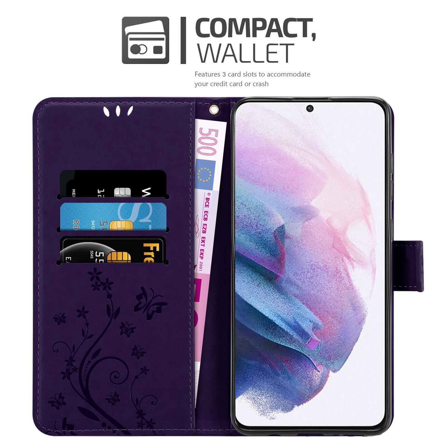 Custodia a portafoglio viola con carte, denaro e un telefono. Design compatto.
