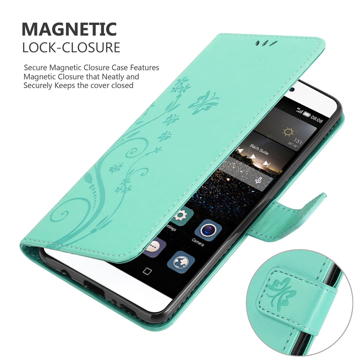 Un telefono è in una custodia a portafoglio aperta, verde, a fantasia floreale. La custodia ha una chiusura magnetica.