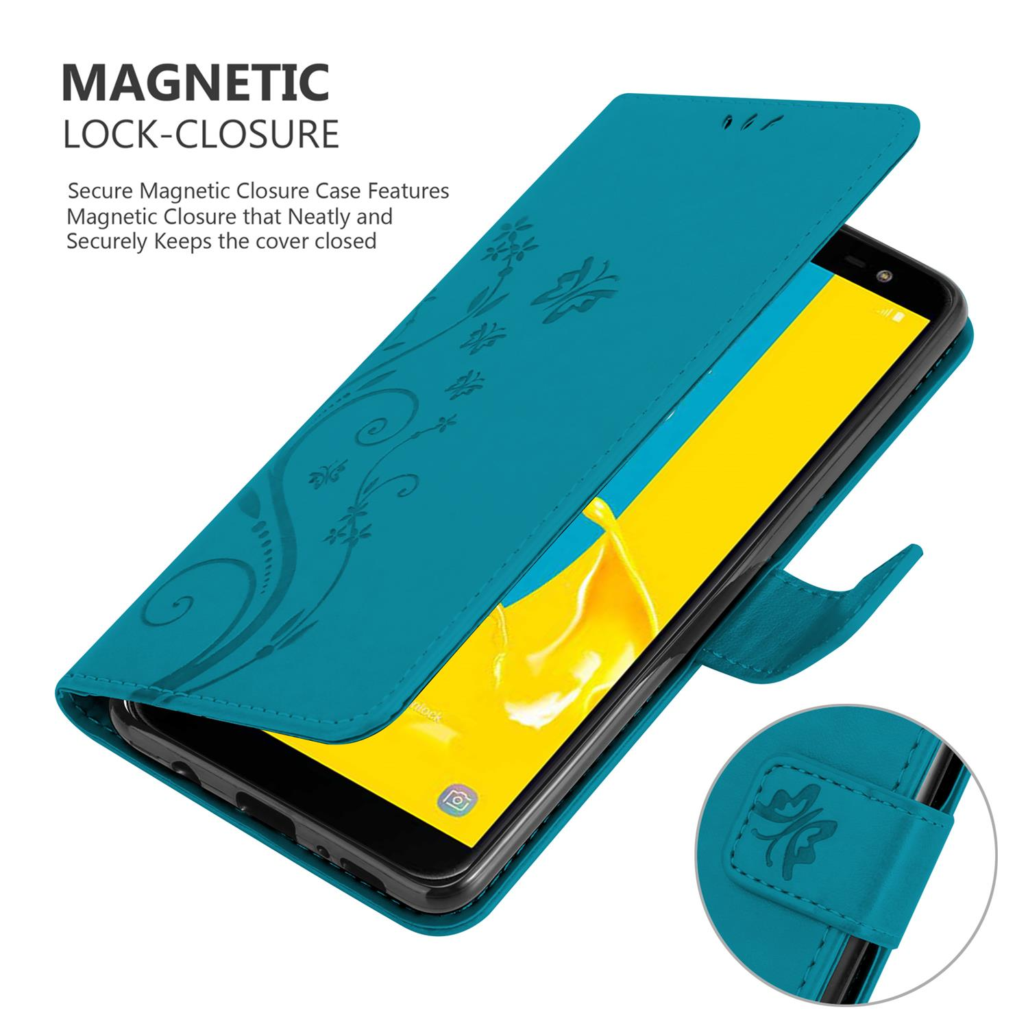 Türkisfarbene Handyhülle, offen. Telefon ist drin. Hülle hat Blumendesign, Magnetverschluss.