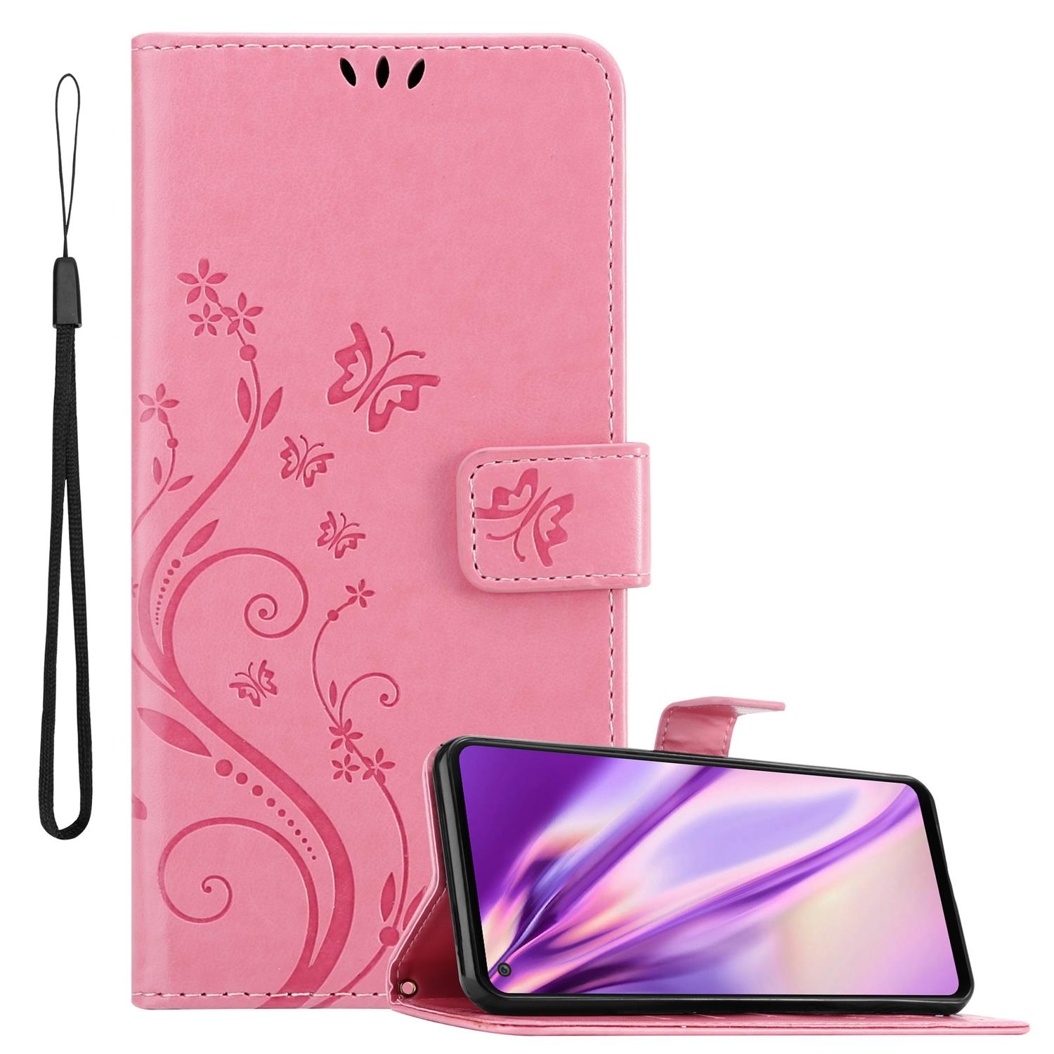 Étui de téléphone rose avec motif floral et papillons, téléphone à l'intérieur.