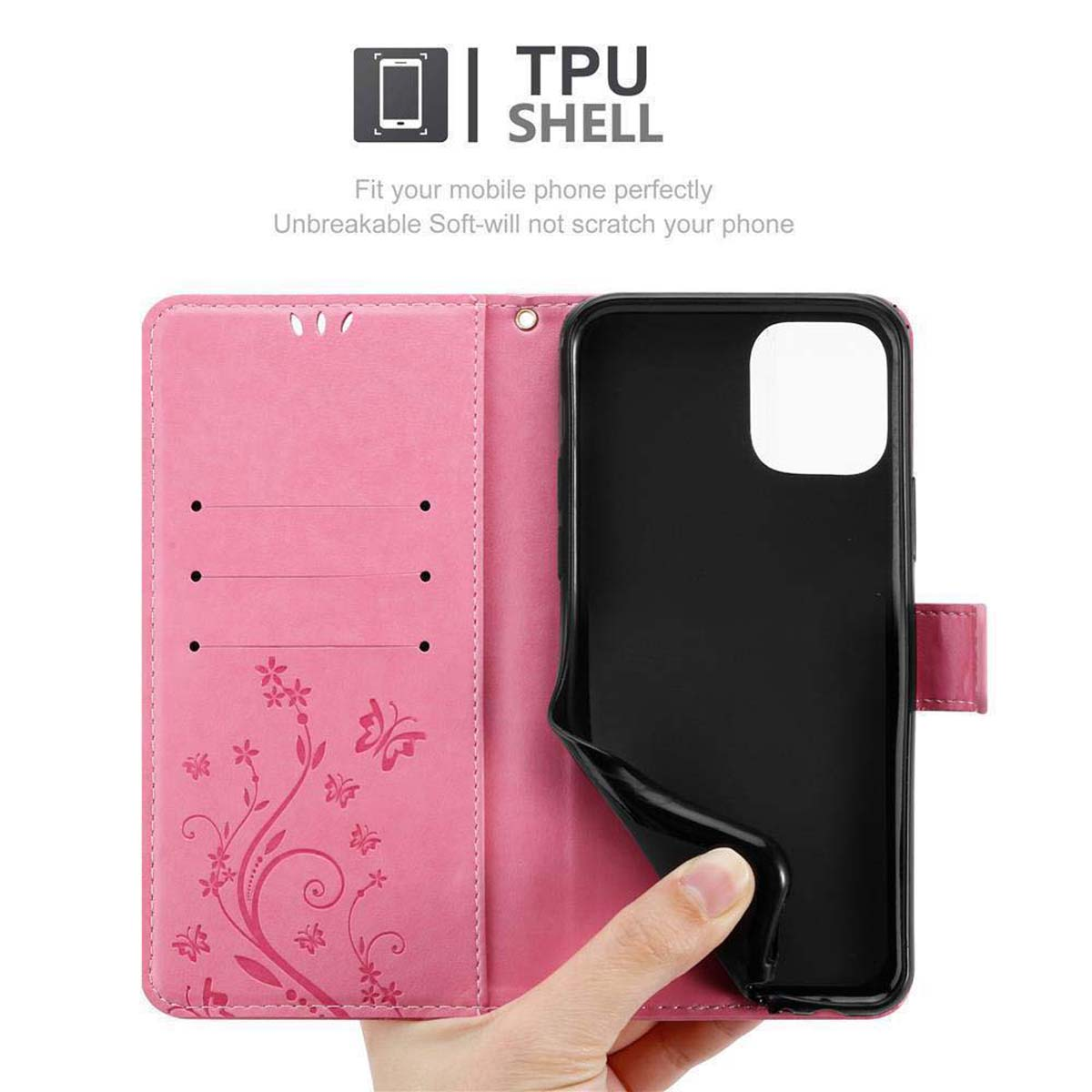 Custodia rosa per telefono aperta, che tiene un telefono nero. Design floreale a sinistra. Sfondo bianco. Mano.