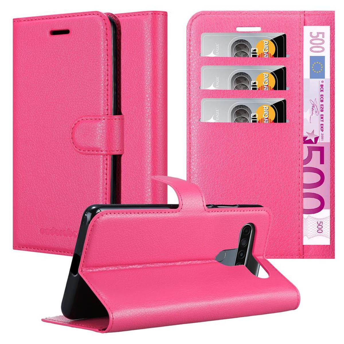 Custodia per telefono rosa, aperta, con telefono all'interno. Carte e denaro visibili.