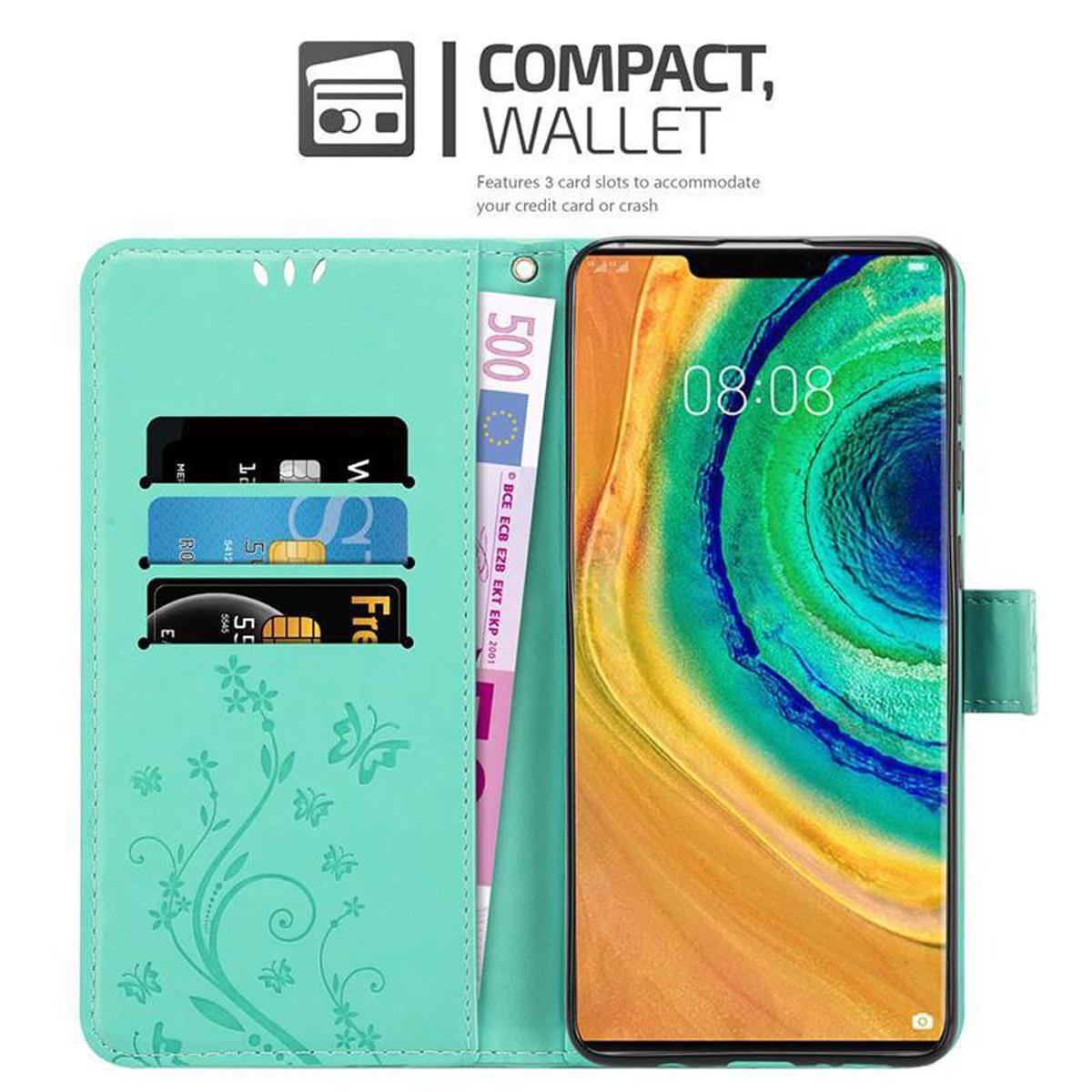 Custodia verde con telefono aperto. La custodia ha fessure per carte e mostra lo schermo del telefono.