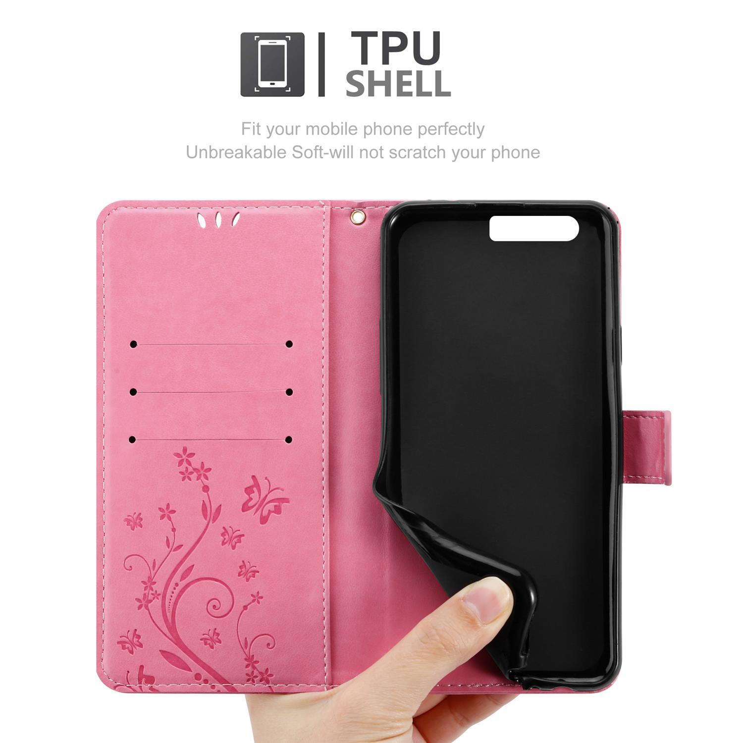 Custodia per telefono rosa con un design floreale, un telefono è all'interno. La custodia è aperta.