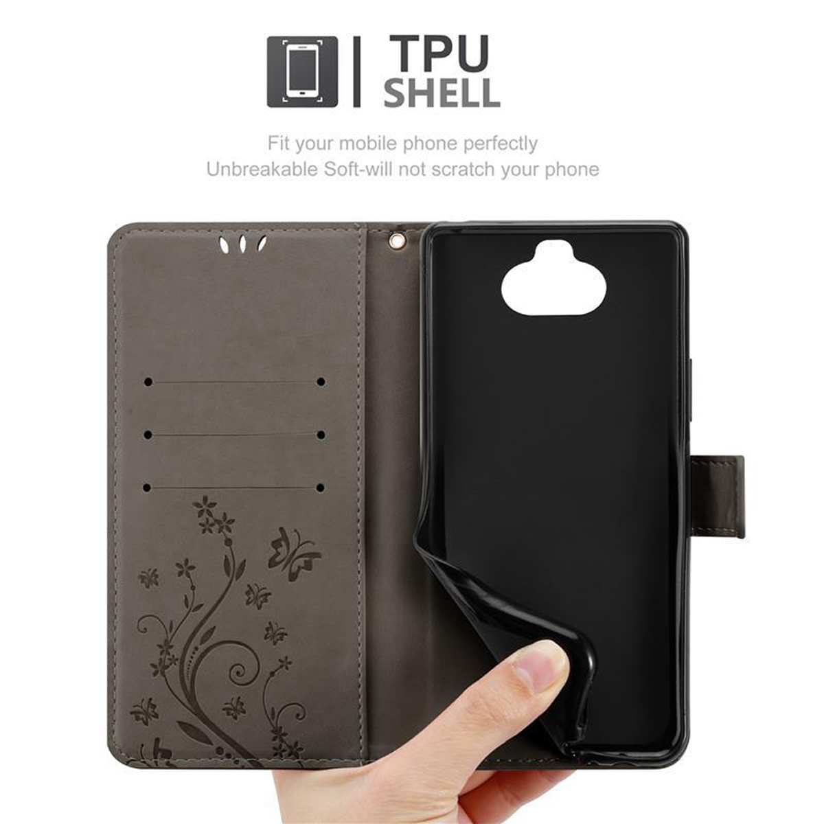 Una custodia per telefono aperta per rivelare il telefono. La custodia è grigia e ha un design floreale. Una mano sta staccando la parte del telefono.