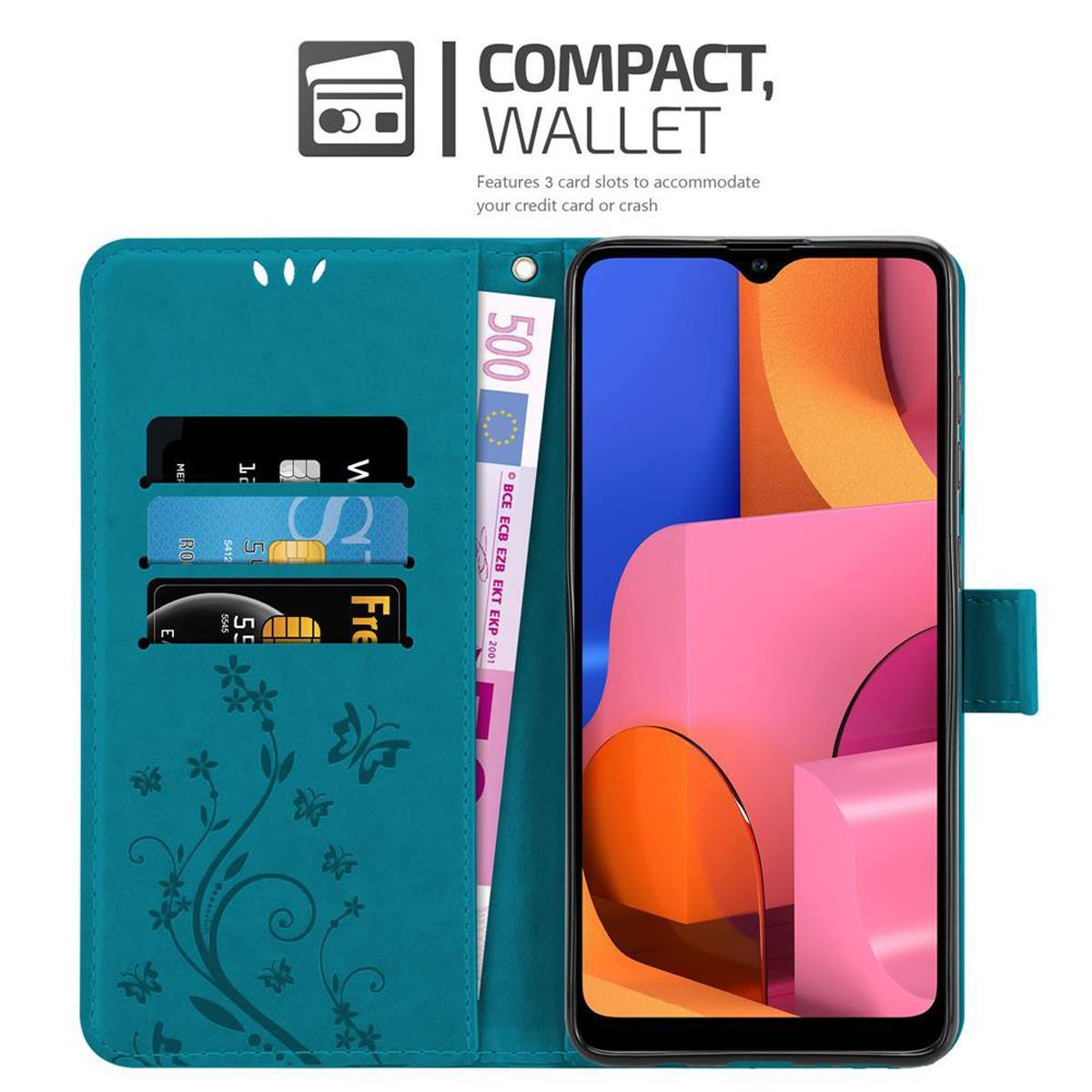 Custodia a portafoglio turchese con telefono, carte di credito e denaro. Presenta un design floreale e farfalle.