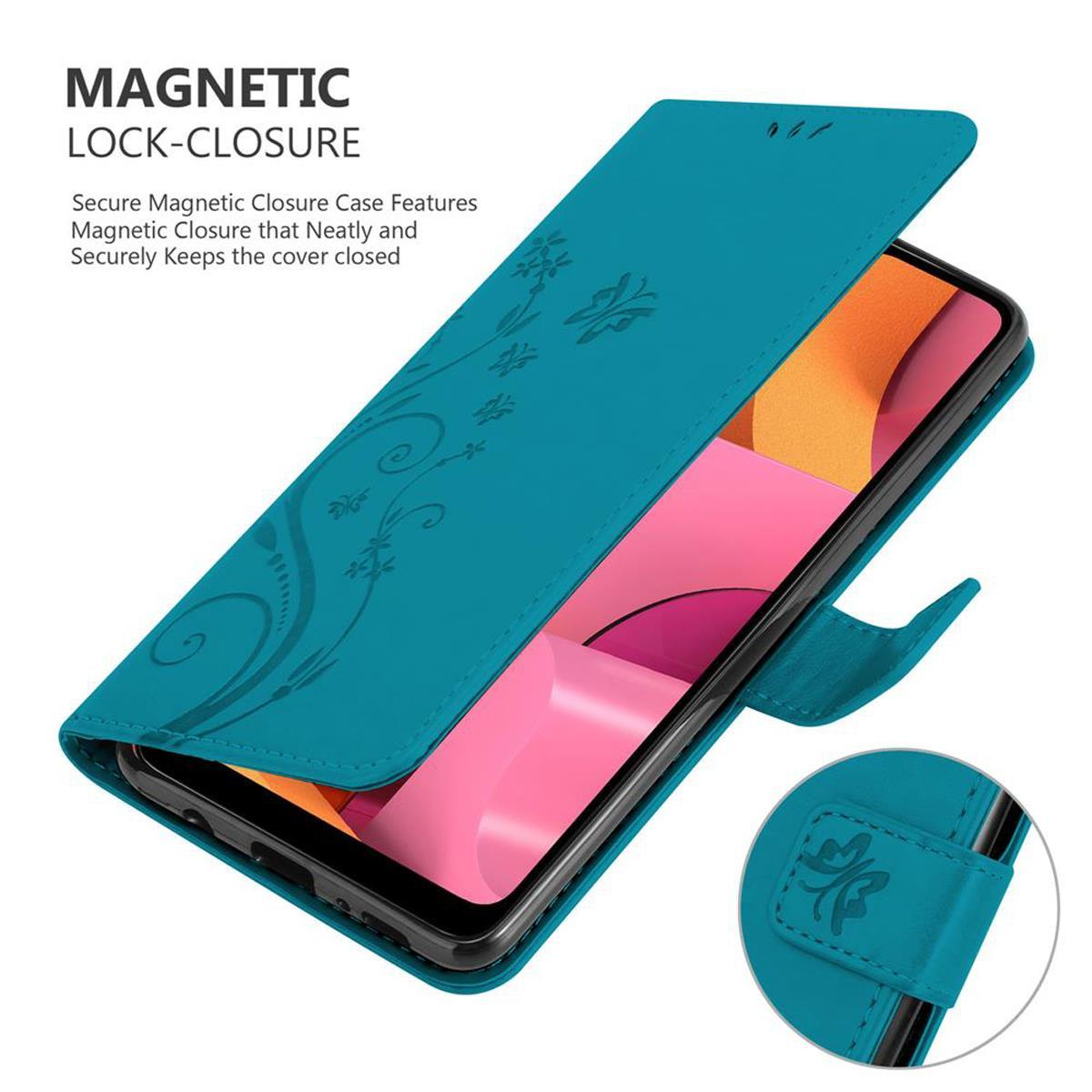 Custodia teal per telefono con un telefono all'interno e un motivo decorativo.