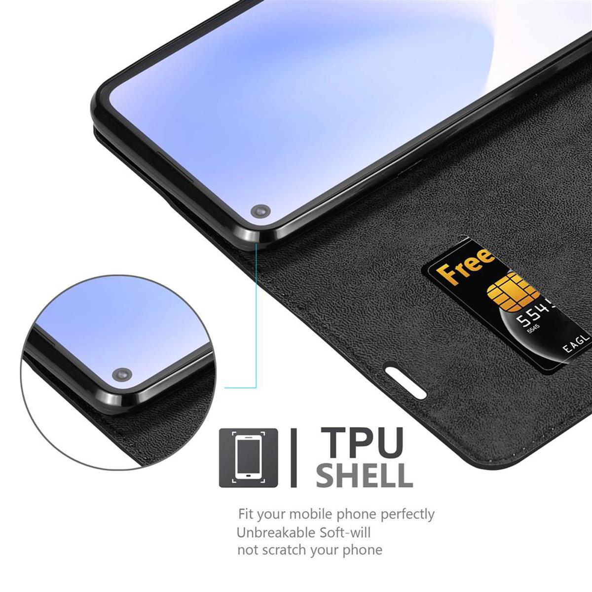 Telefono dentro una custodia nera, con SIM card gratuita. Testo: TPU Shell.