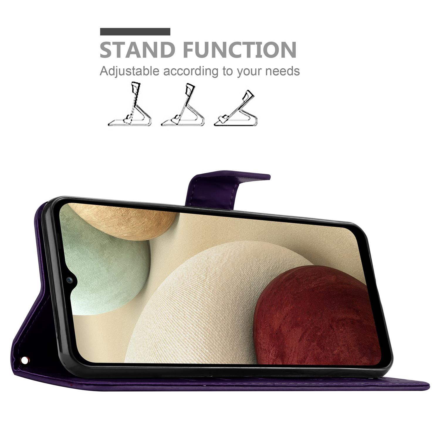 Un telefono in una custodia viola aperta, schermo visibile, che mostra la schermata iniziale con funzione stand.