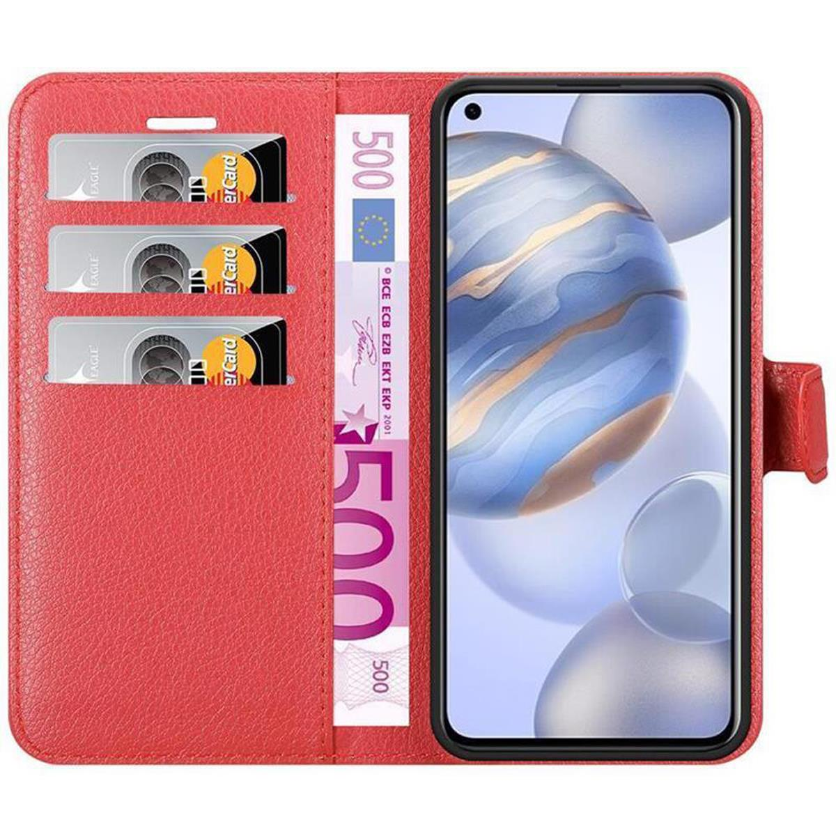 Custodia rossa per telefono con fessure per carte di credito e scomparto per contanti. Un telefono è visibile. La custodia contiene denaro e carte.