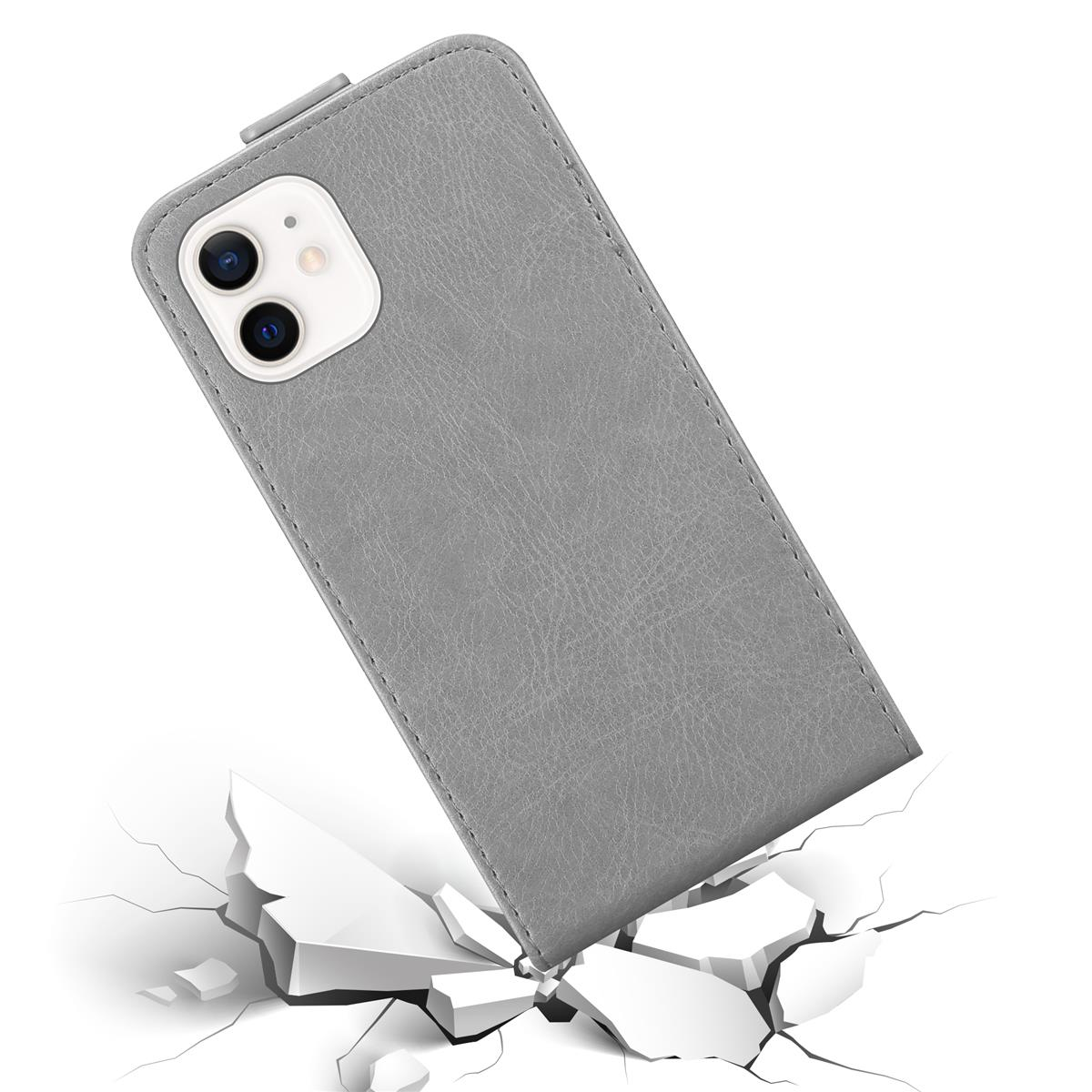 Custodia per telefono grigia con sporgenza della fotocamera e una crepa nel terreno. La custodia sta cadendo.