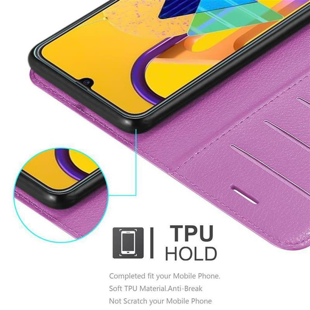 Custodia viola con telefono all'interno. Dispone di un supporto in TPU e uno schermo del telefono.