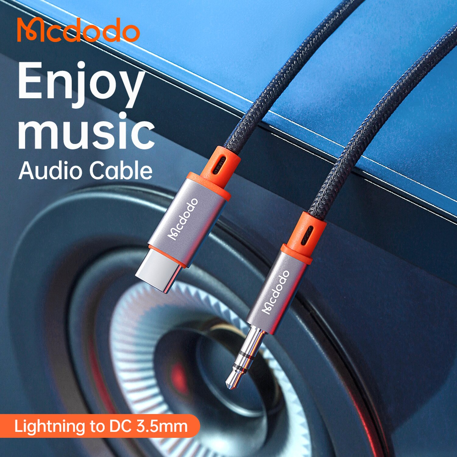 Cavo audio arancione e grigio con USB-C e 3,5 mm.
