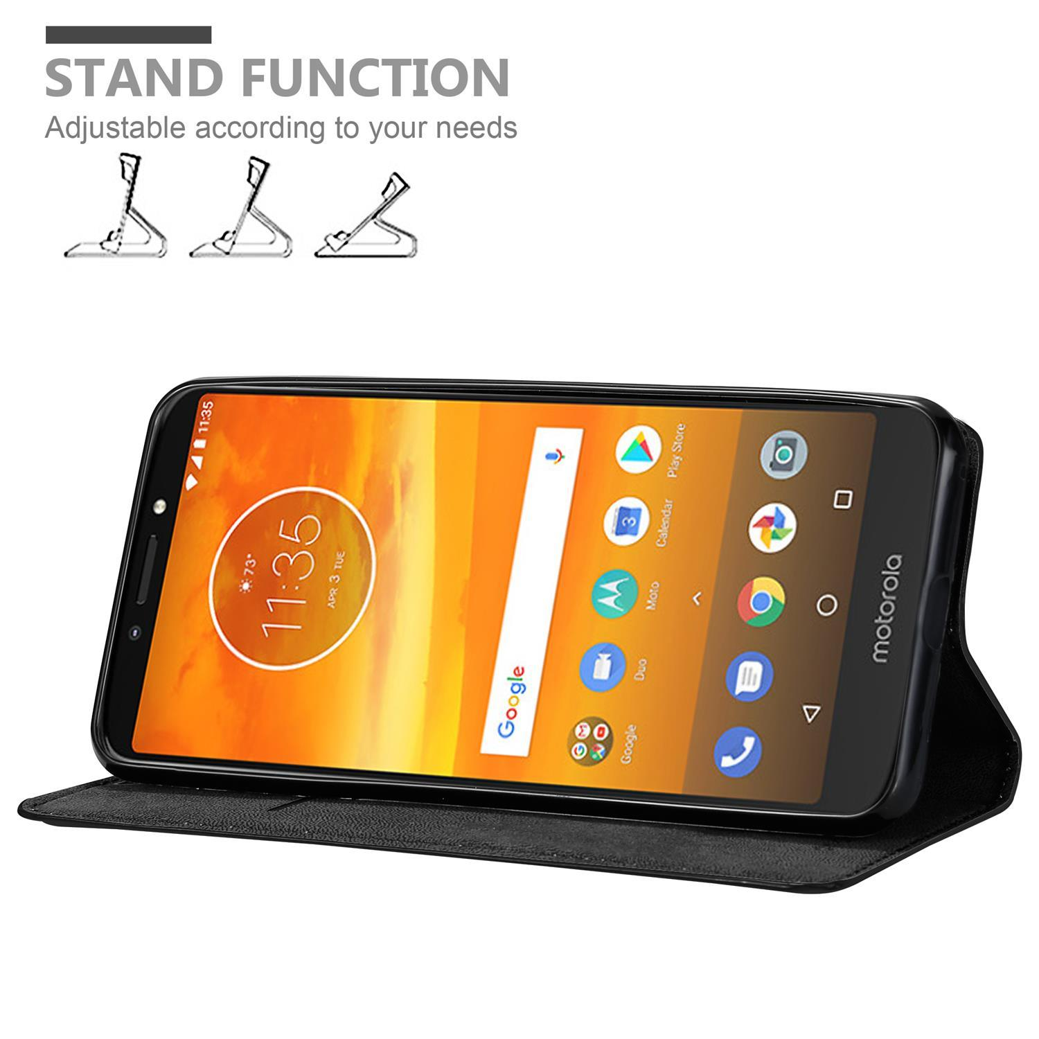 Schwarzes Telefon in einer Brieftaschenhülle, die zum Aufstellen aufgestellt ist. Ein Telefon zeigt die Uhrzeit. Text 'Standfunktion'.
