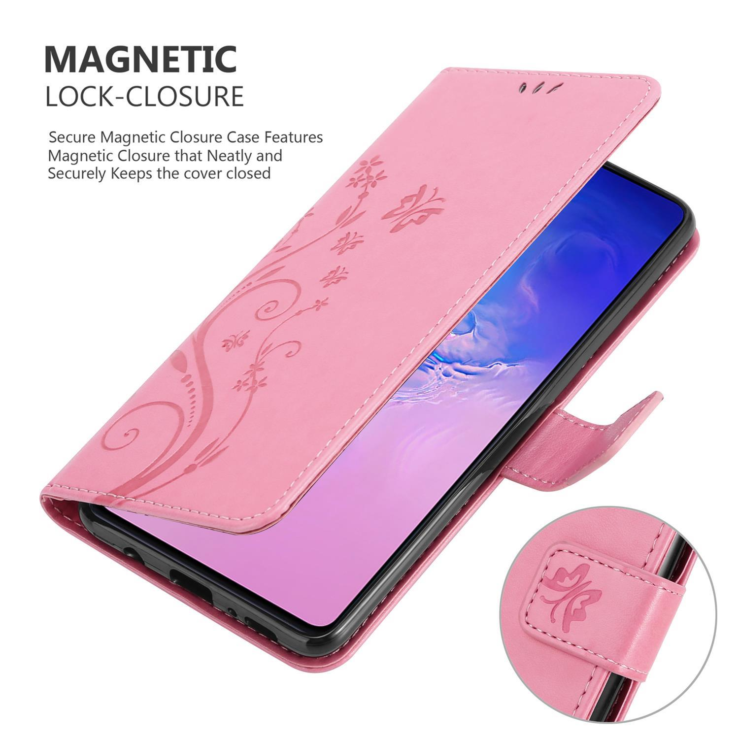 Custodia per telefono rosa con design floreale, aperta, che mostra lo schermo di un telefono. Testo: Chiusura magnetica.
