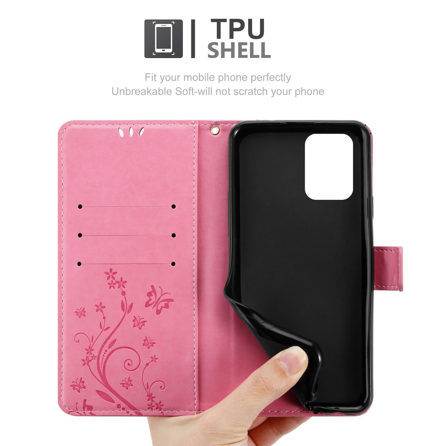 Custodia rosa per telefono, aperta. Una mano tiene un telefono all'interno della custodia. Motivo floreale.